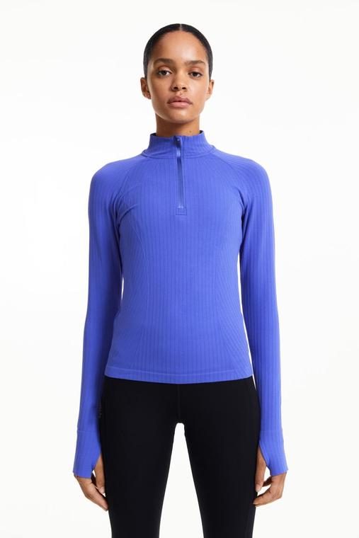 DryMove™ Seamless Half Zip Activewear Top offers at $49.99 in H&M