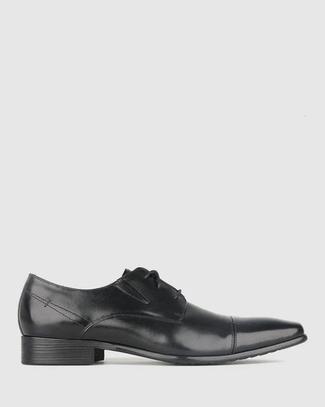 WIDER FIT DEFIANT LEATHER DRESS SHOES offers at $169.99 in Betts