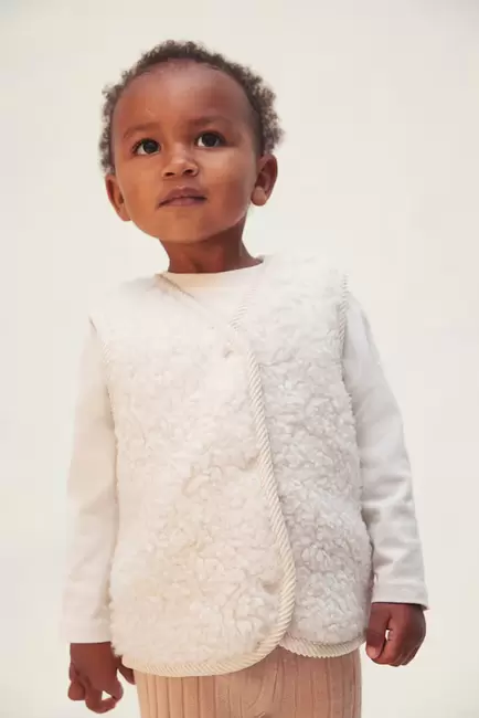 Wool Blend Teddy Vest offers at $64.99 in H&M