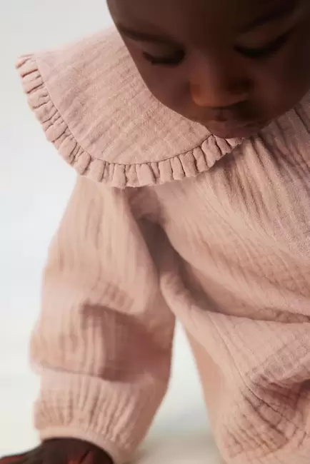 Cotton Muslin Romper offers at $29.99 in H&M